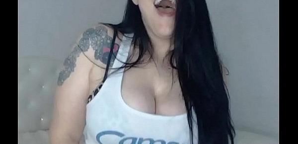  Huge tits brunette in t shirt on cam